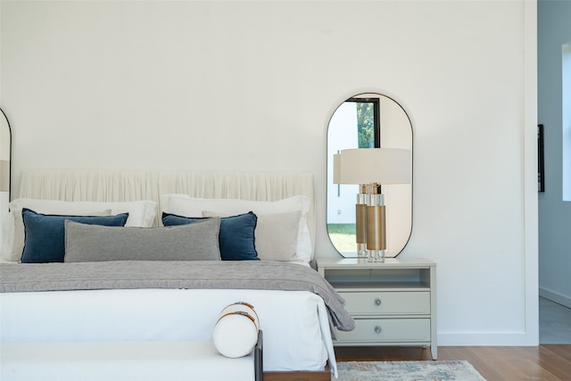 bedroom with light hardwood / wood-style floors