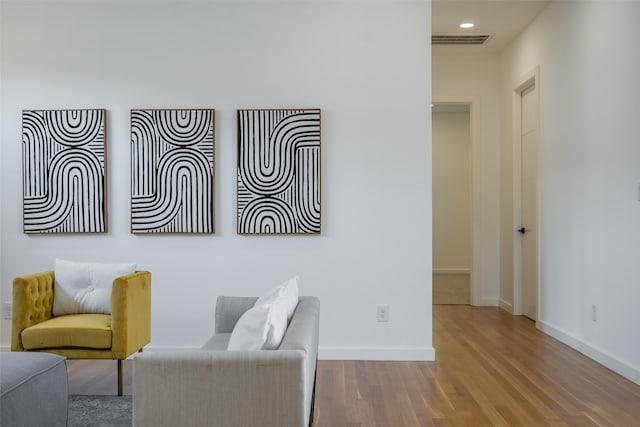 living area featuring wood-type flooring