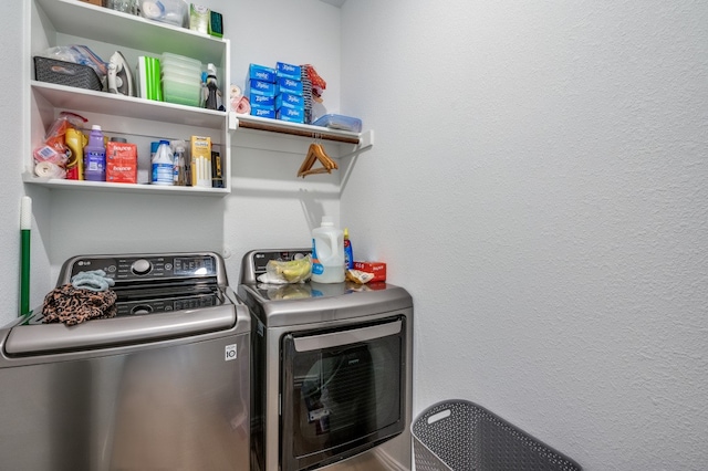 laundry room featuring washing machine and dryer