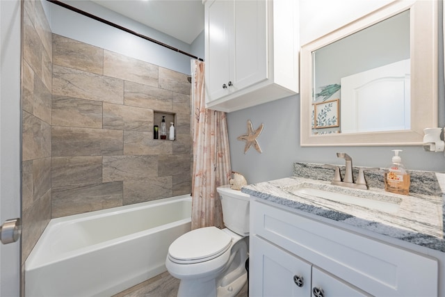 full bathroom with shower / tub combo, vanity, toilet, and hardwood / wood-style flooring