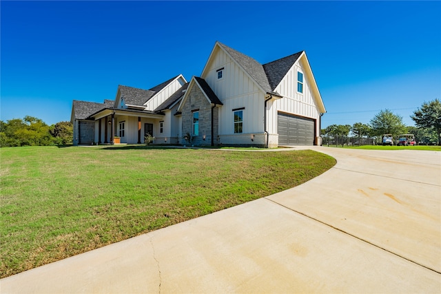 modern farmhouse style home with a front yard