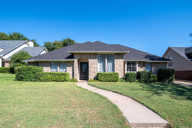 ranch-style house with a front yard