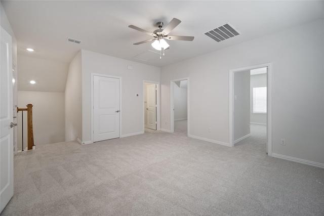 unfurnished bedroom with baseboards, recessed lighting, visible vents, and light colored carpet