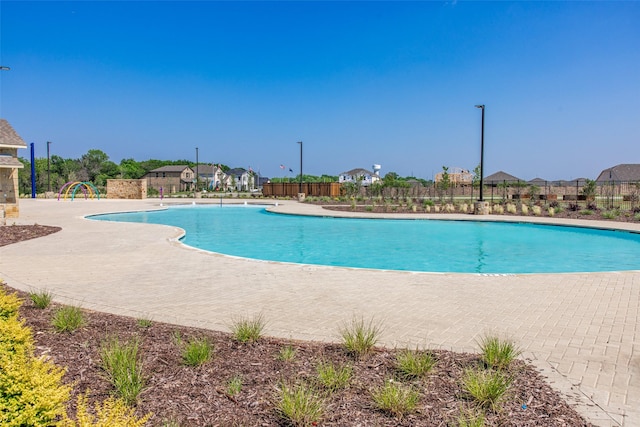 pool featuring fence