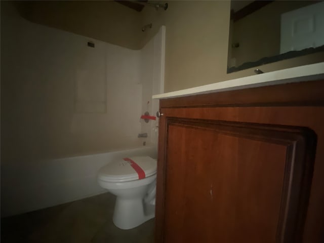 full bathroom featuring shower / bathing tub combination, vanity, tile patterned flooring, and toilet