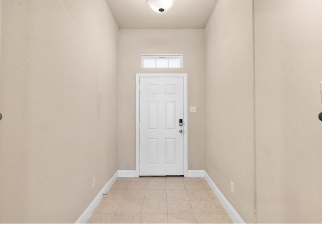 entryway featuring light tile patterned floors