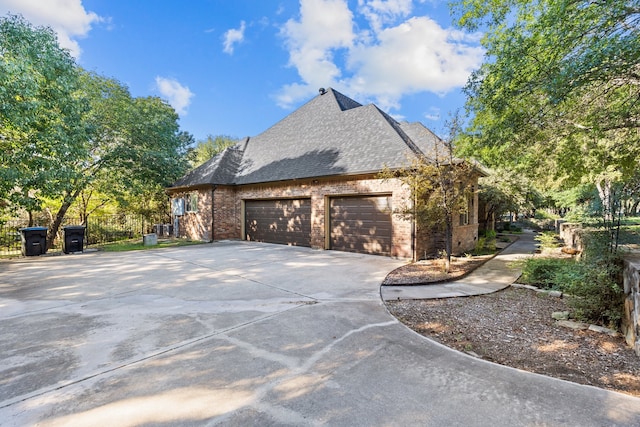 view of home's exterior featuring a garage