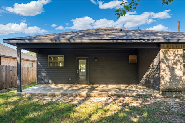 rear view of property with a patio area