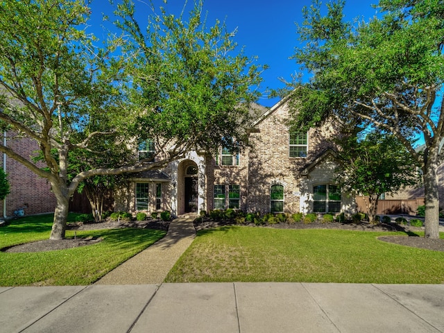 view of front of home with a front yard