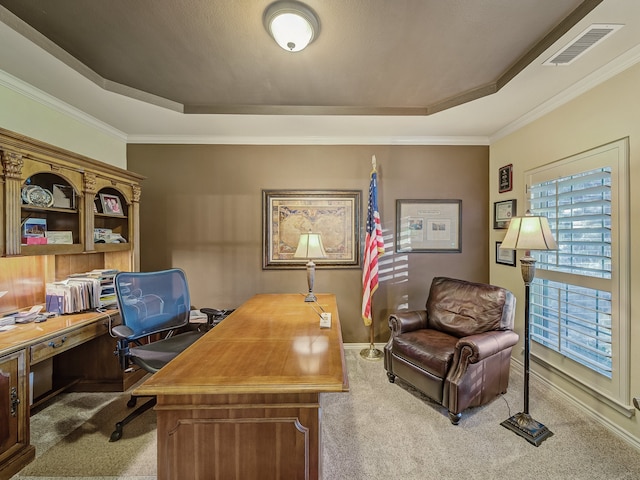 office area featuring light carpet, a raised ceiling, and ornamental molding