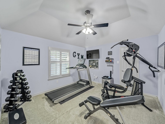 workout room with lofted ceiling, ceiling fan, and carpet floors