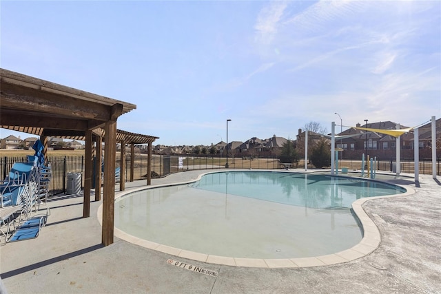 view of swimming pool featuring a patio and a pergola