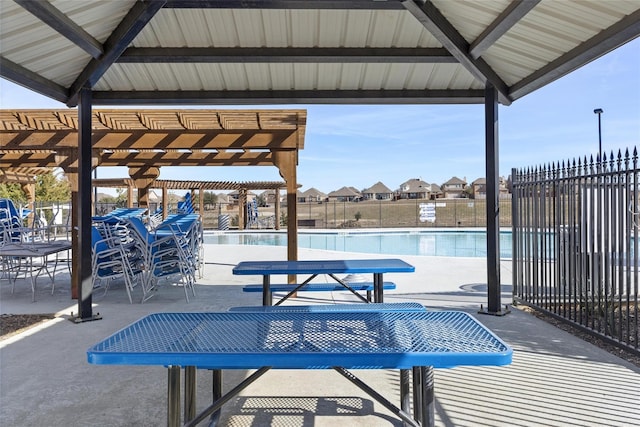 view of patio featuring a pergola, a gazebo, and a community pool