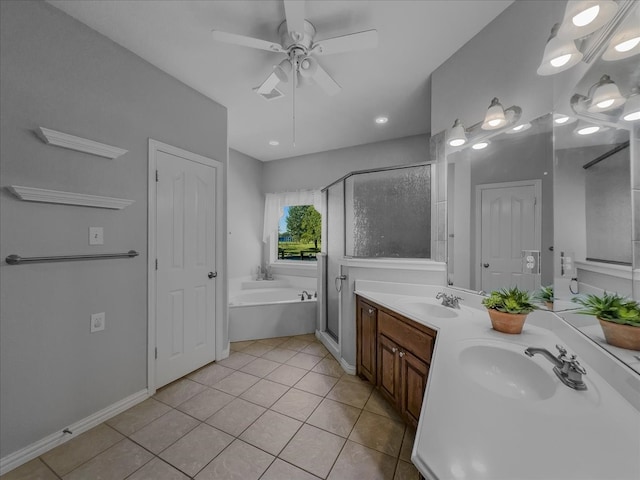 bathroom with shower with separate bathtub, tile patterned flooring, ceiling fan, and vanity