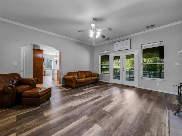 living room featuring ornamental molding, ceiling fan, and hardwood / wood-style flooring