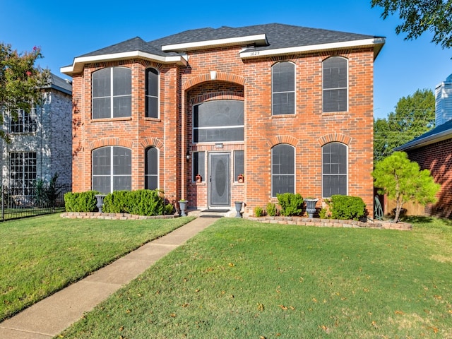 view of front facade with a front lawn