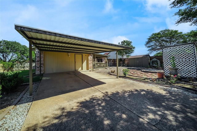 exterior space with a shed and a carport