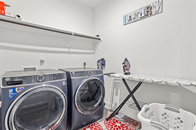 laundry area featuring washer and clothes dryer