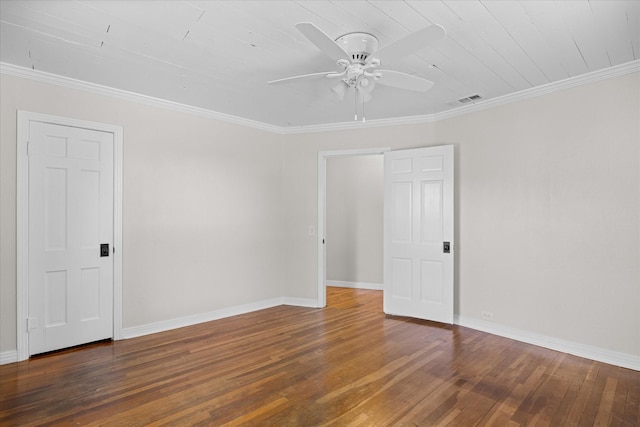 spare room with ceiling fan, dark hardwood / wood-style flooring, and ornamental molding