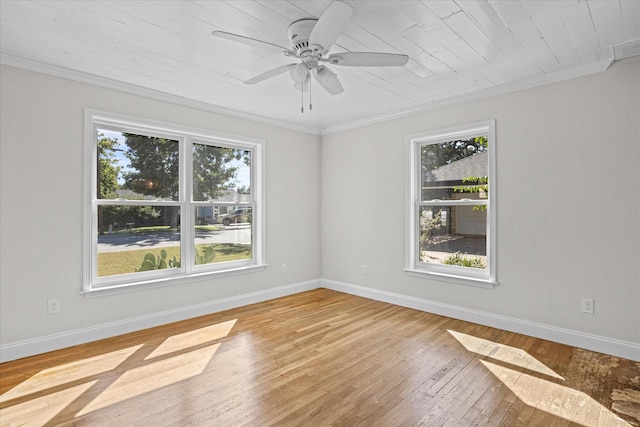 empty room with light wood-type flooring, ceiling fan, ornamental molding, and wood ceiling