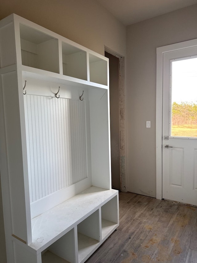 mudroom with wood-type flooring