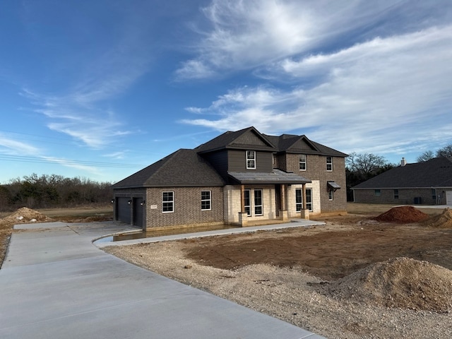 view of front of property with a garage