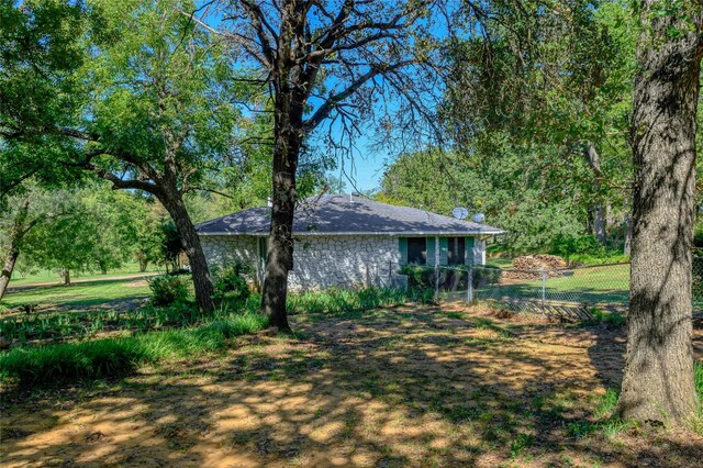 1498 Riley Rd, Whitesboro, TX 76273 - view of yard featuring fence