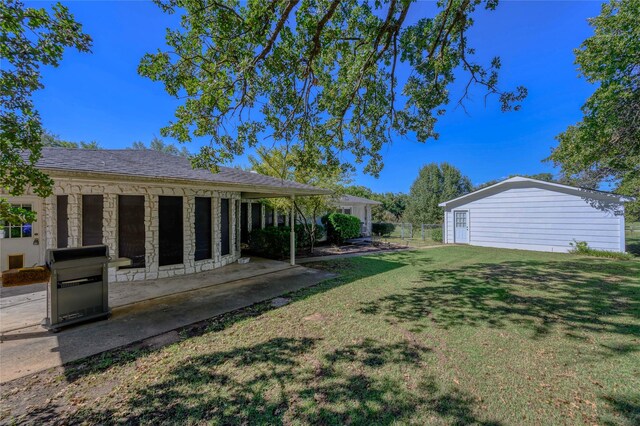 1498 Riley Rd, Whitesboro, TX 76273 - view of yard with a patio area