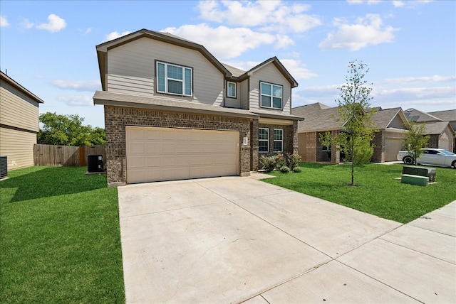 view of front of home with a garage, a front lawn, and central air condition unit