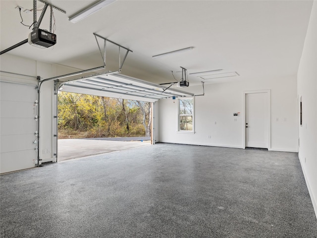 garage featuring a garage door opener