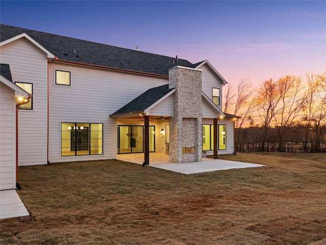 1229 Hunt Rd, Gunter, TX 75058 - back of property with a patio area, a lawn, a chimney, and ceiling fan