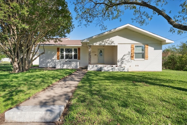 ranch-style home with a front yard