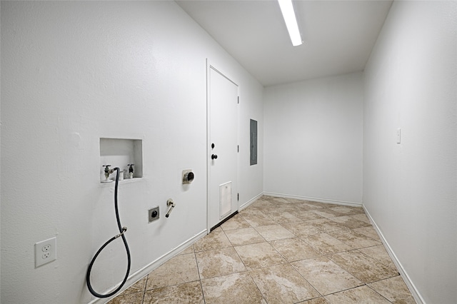 clothes washing area featuring washer hookup, light tile patterned flooring, electric panel, gas dryer hookup, and electric dryer hookup