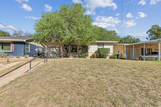 view of front of home with a front lawn and a carport