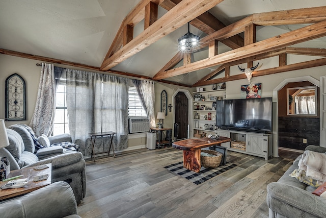 living room featuring cooling unit, beam ceiling, high vaulted ceiling, and hardwood / wood-style flooring