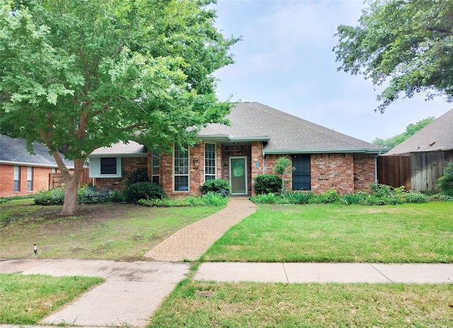 ranch-style house with a front lawn