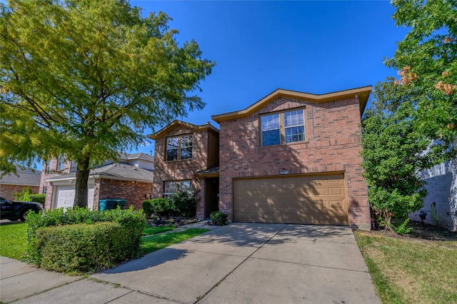 front of property with a garage