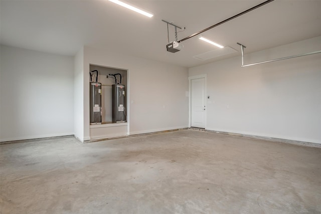 garage with water heater and a garage door opener