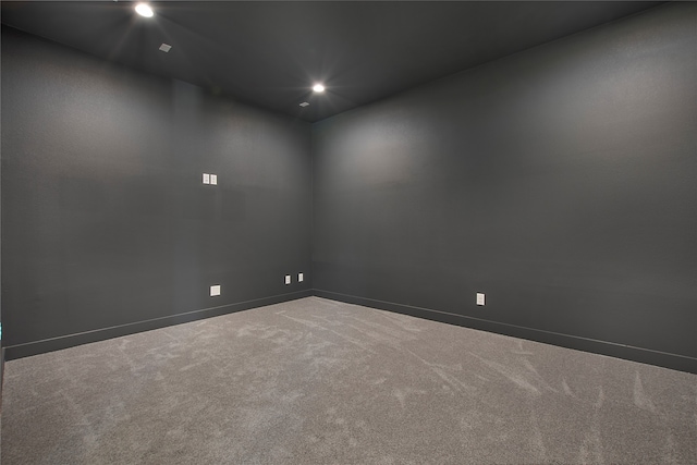 empty room with carpet flooring