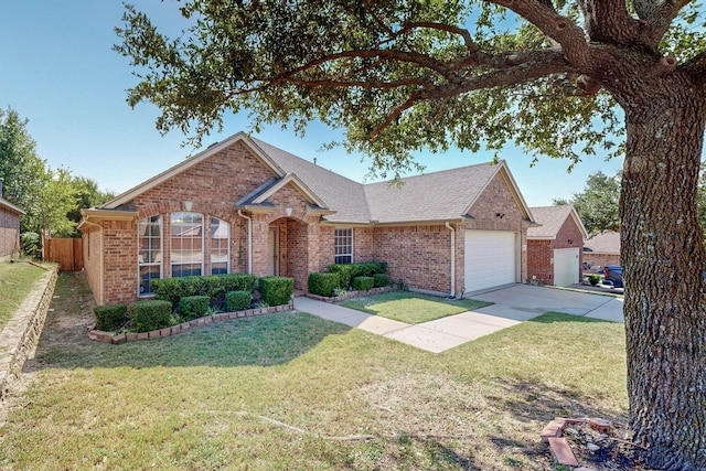 single story home with a garage and a front yard