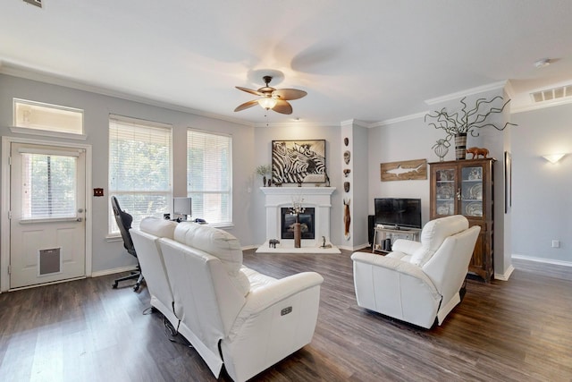 living room with ceiling fan, dark hardwood / wood-style floors, and ornamental molding