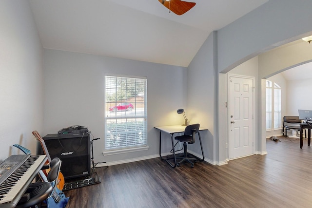 office space with dark wood-type flooring, vaulted ceiling, and ceiling fan