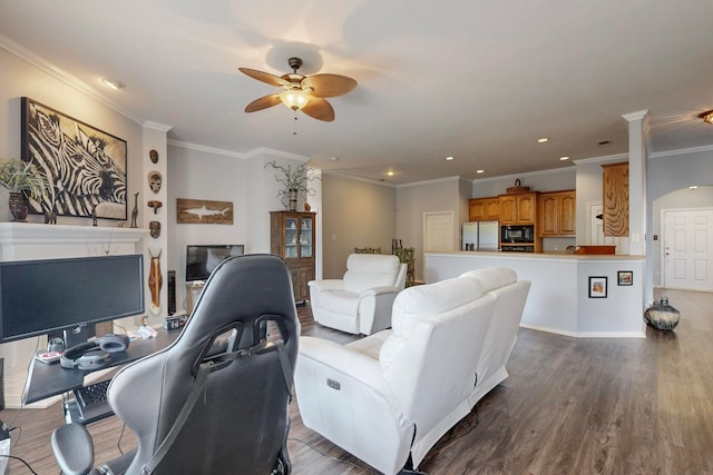 living room with ceiling fan, crown molding, and dark hardwood / wood-style flooring