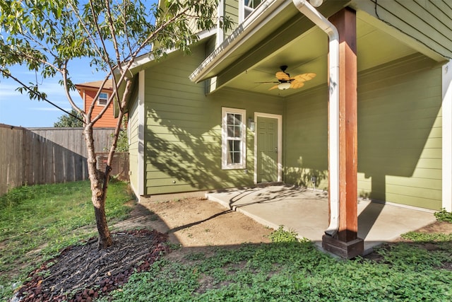 exterior space with a patio and ceiling fan