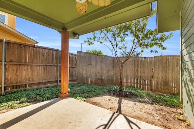 view of patio featuring ceiling fan