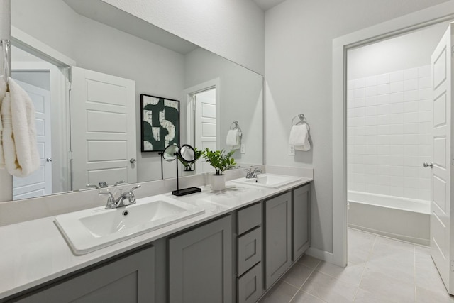 bathroom featuring vanity, bathing tub / shower combination, and tile patterned floors