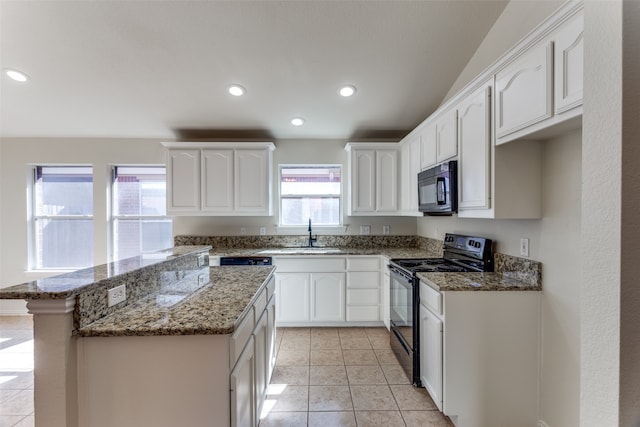 kitchen with black appliances, stone countertops, and white cabinets