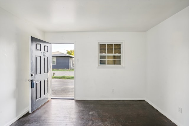 entrance foyer featuring dark hardwood / wood-style floors