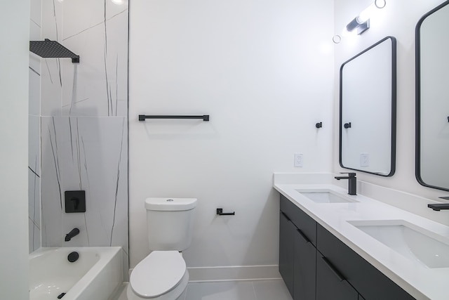 full bathroom featuring tile patterned flooring, vanity, toilet, and tiled shower / bath