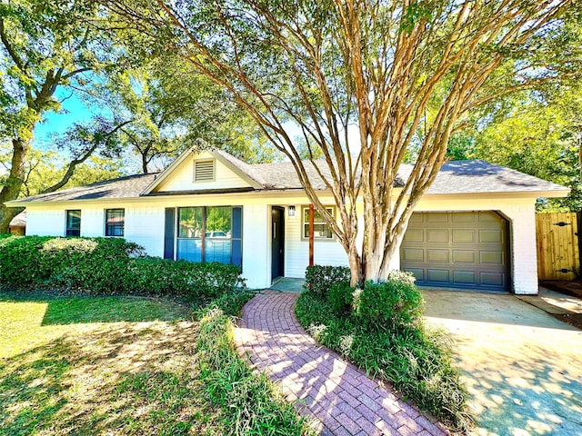 single story home with a garage